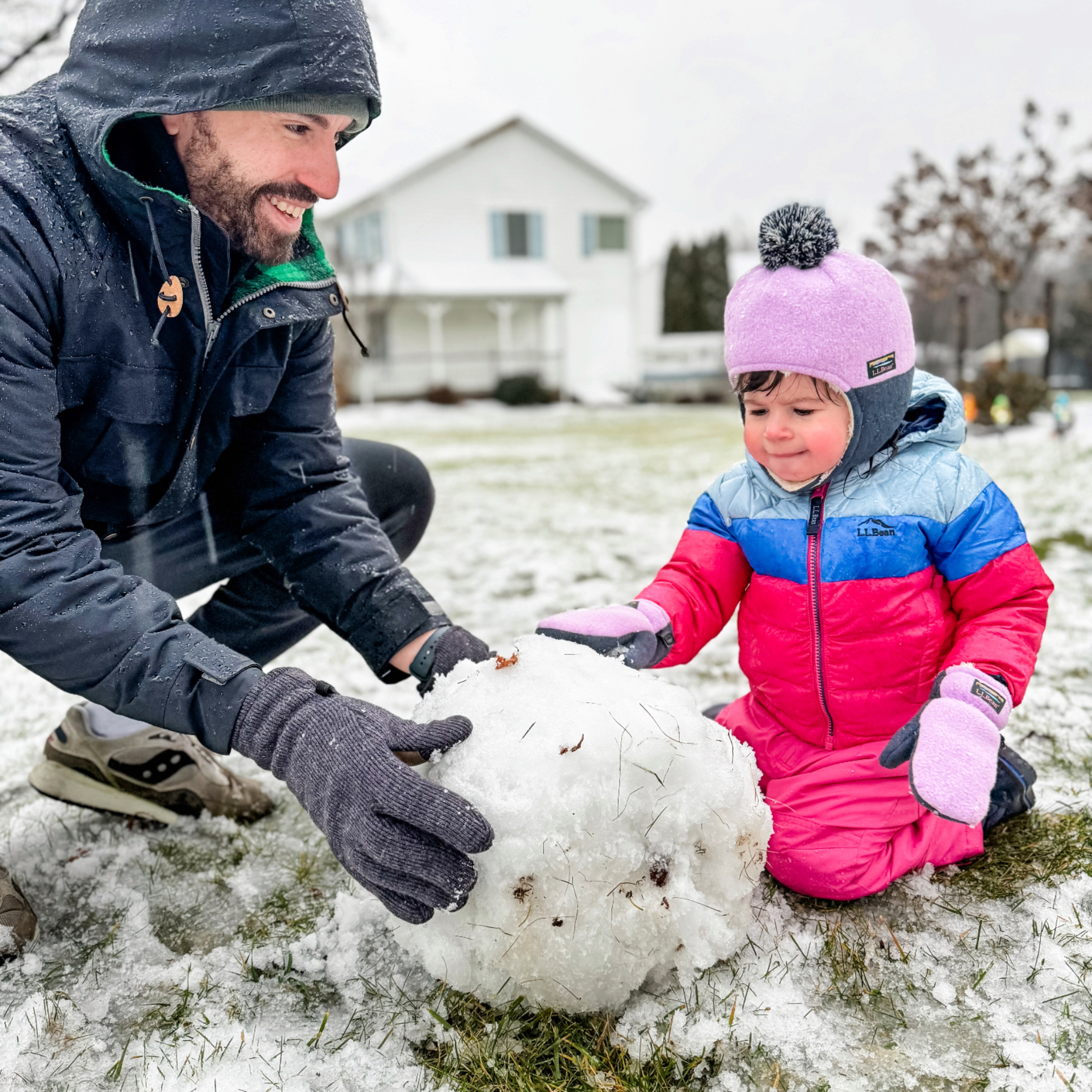 Teaching the kids how to make a snowman